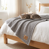 Pawfect Touch Weighted Calming Blanket — quilted texture detail with a cat resting on top
