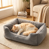 Cat sleeping peacefully in the Pawfect grey pet bed, cozy bedroom